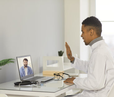 A medical staff explaining to a man